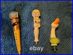 3 beer tap handles Modelo, Goose island, Samuel Adams