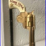 A Figural Lone Star Beer Gun Tap Handle