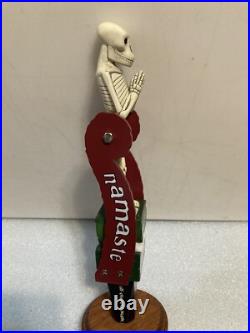 DOGFISH HEAD NAMASTE TILTING SKELETON PENDELUM draft beer tap handle. DELAWARE