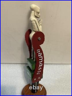 DOGFISH HEAD NAMASTE TILTING SKELETON PENDELUM draft beer tap handle. DELAWARE