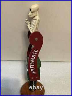DOGFISH HEAD NAMASTE TILTING SKELETON PENDELUM draft beer tap handle. DELAWARE