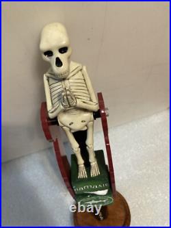 DOGFISH HEAD NAMASTE TILTING SKELETON PENDELUM draft beer tap handle. DELAWARE