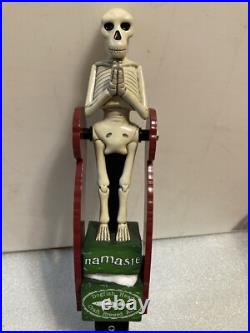 DOGFISH HEAD NAMASTE TILTING SKELETON PENDELUM draft beer tap handle. DELAWARE