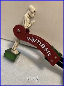 DOGFISH HEAD NAMASTE TILTING SKELETON PENDELUM draft beer tap handle. DELAWARE