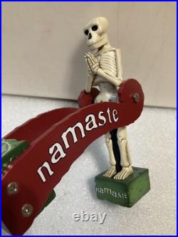 DOGFISH HEAD NAMASTE TILTING SKELETON PENDELUM draft beer tap handle. DELAWARE