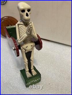 DOGFISH HEAD NAMASTE TILTING SKELETON PENDELUM draft beer tap handle. DELAWARE